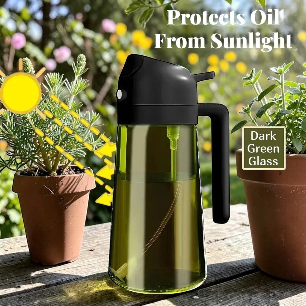 The OmniPour™ dark green glass misting oil dispenser bottle with handle and trigger for even oil spray.