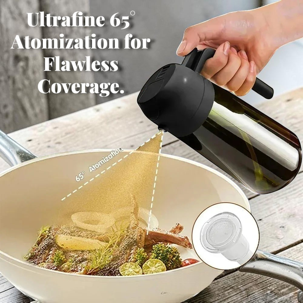 The OmniPour™ glass oil mister with handle dispenses a fine mist for cooking, featuring a gravity sensor lid and fine mesh filter.